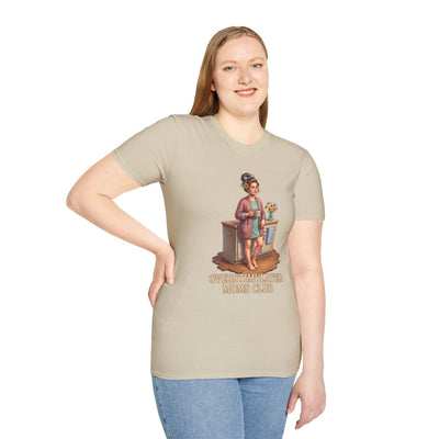 A woman standing, smiling at the camera, wearing a fitted beige Overstimulated Shirt - Overstimulated Moms Club